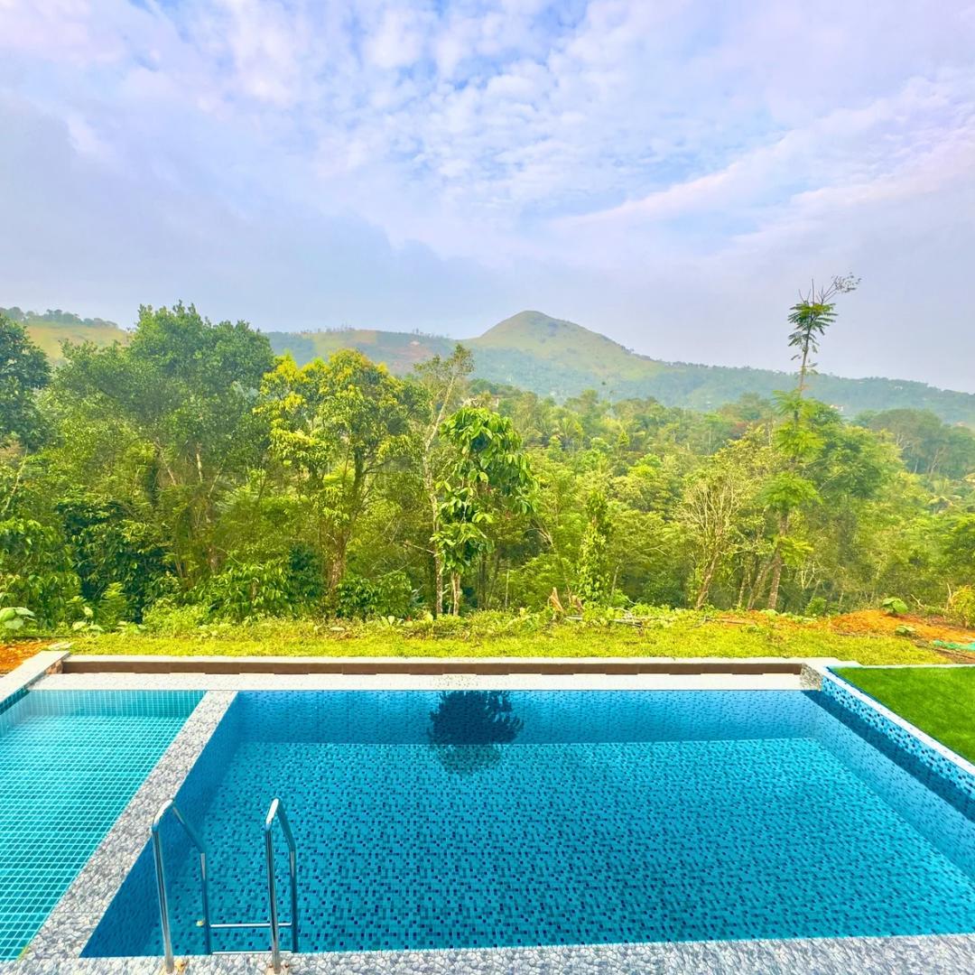 Vagamon Hillvalley Pool Resort - Tap to explore photos