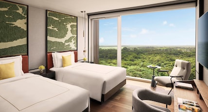 Taj The Trees Mumbai Room Type - Cottage garden view twin bed Taj The Trees Mumbai Room Type - Cottage garden view twin bed