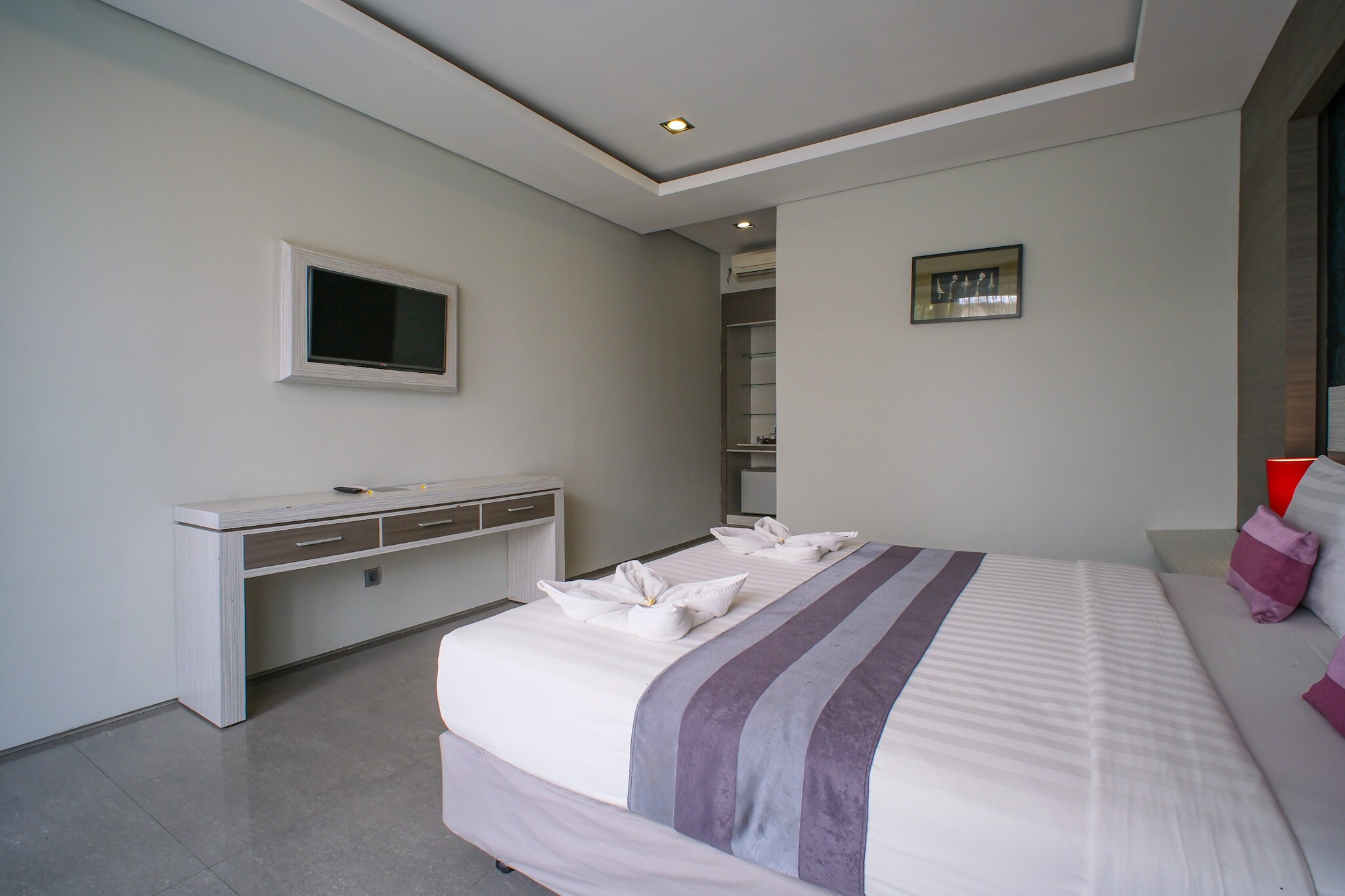 Kamini Legian Hotel - Tap to explore photos