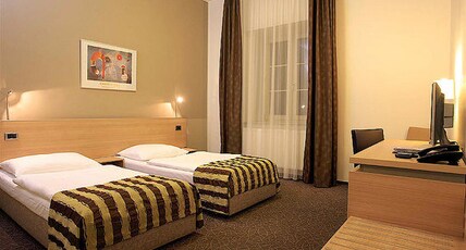 Sunciti Extension Room Type - Deluxe Room