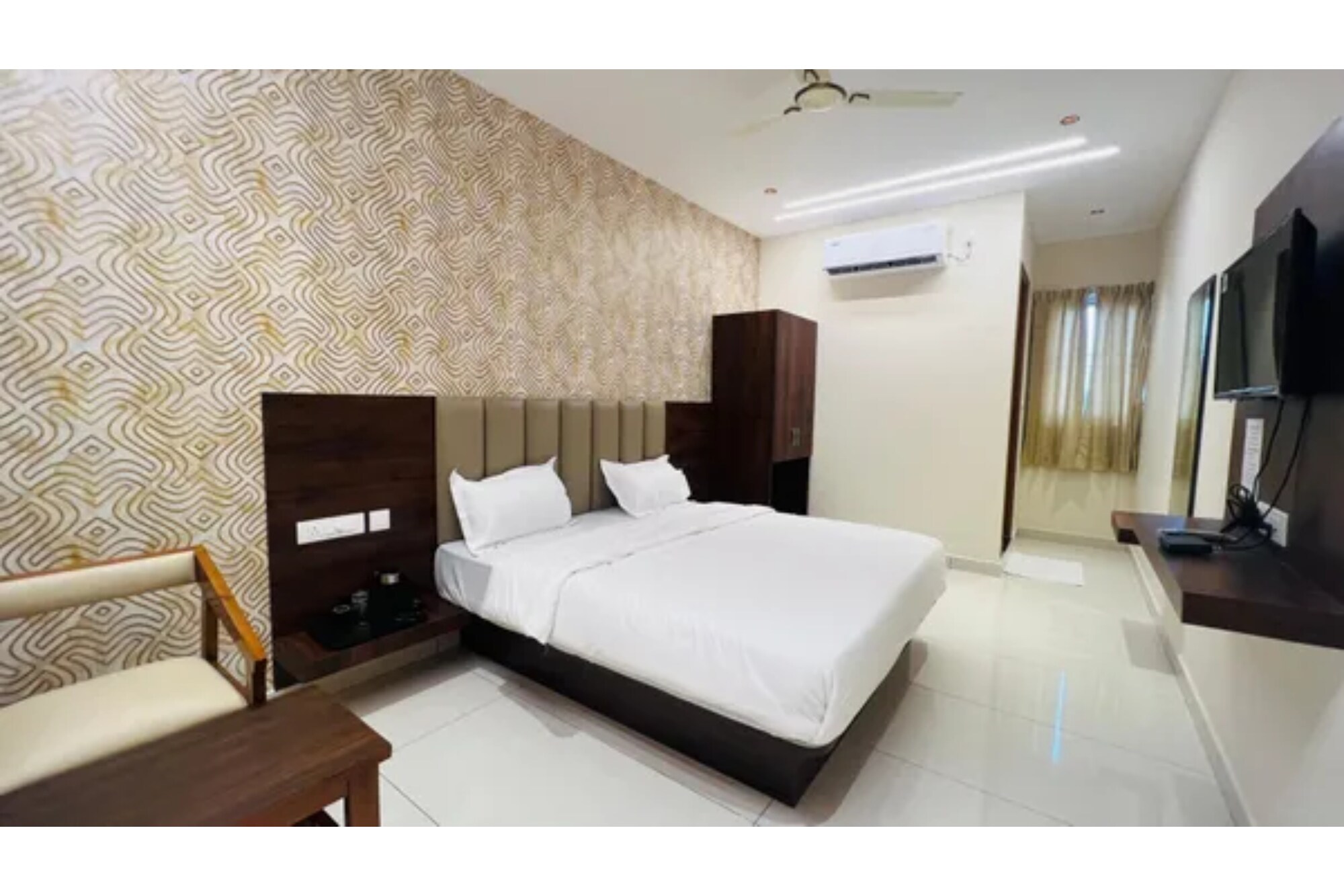 FabHotel Golden Inn KR Puram - Tap to explore photos