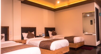 Hotel Mahakala Room Type - LAVA SUPER DELUXE (Triple Bed-3 Single Bed)