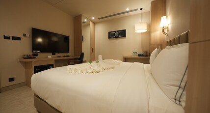 Pride Elite, Raipur Room Type - Premium King Room