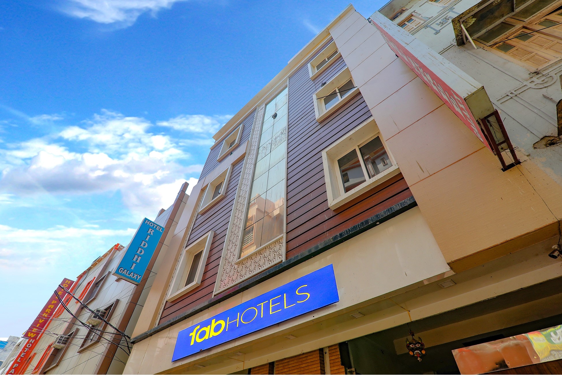 FabHotel Shree Galaxy - Tap to explore photos