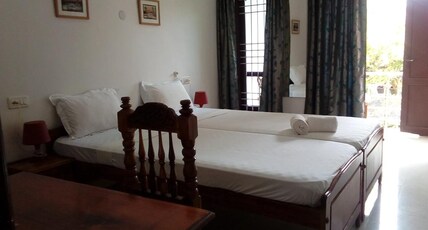 Cosmic holiday inn Room Type - Deluxe Non-Ac