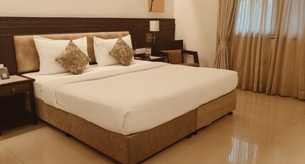 Hotel Pavillion Room Type - Deluxe Queen Bed AC Room