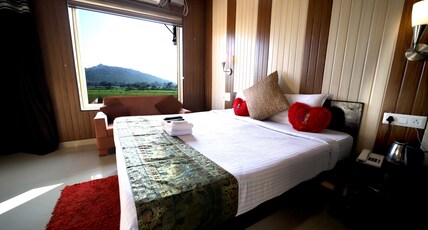 Bundeli Farm Resort & Banquet Room Type - Premium Room with mountain View Balcony Bundeli Farm Resort & Banquet Room Type - Premium Room with mountain View Balcony