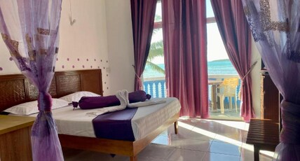 Coco Villa Room Type - Deluxe Double Room with Balcony and Sea View