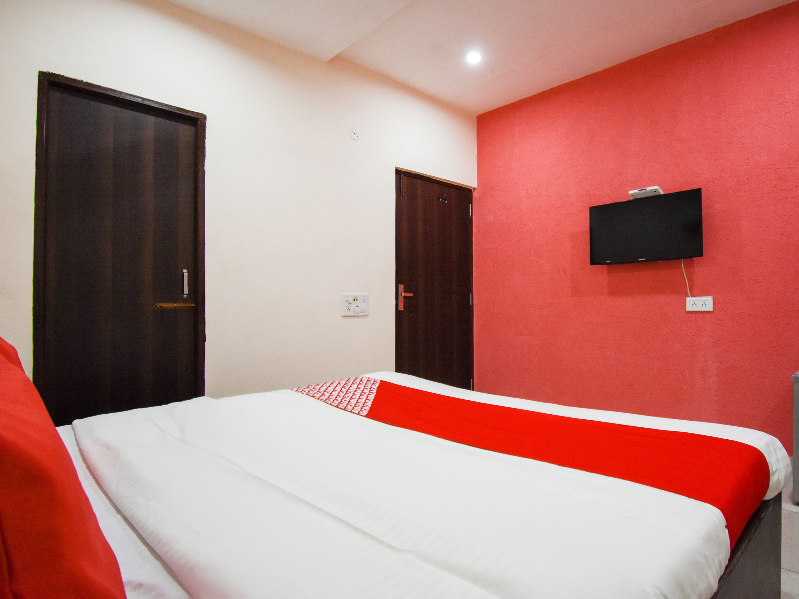 Hotel O Happy Living - Tap to explore photos
