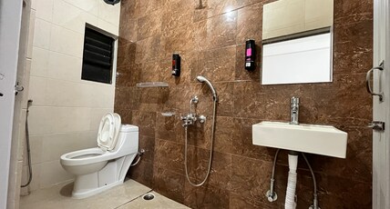 Urban Crest Beltola Room Type - Double Deluxe Room