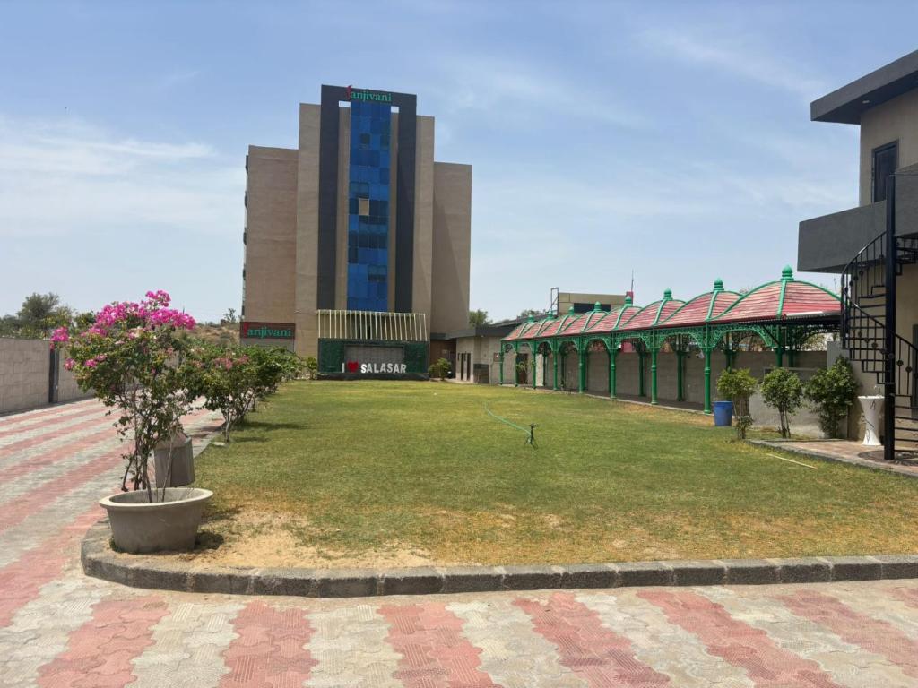 Hotel Sanjivani Salasar - Tap to explore photos