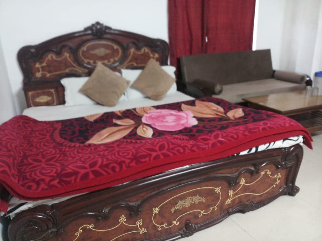 Hotel Jain Regency - Tap to explore photos