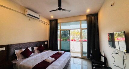 Surabhi Comforts Room Type - Standard Room with Balcony- AC