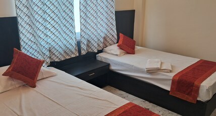 HOTEL PRATYAKSH DARSHAN Room Type - Twin Bed Non A.C Room