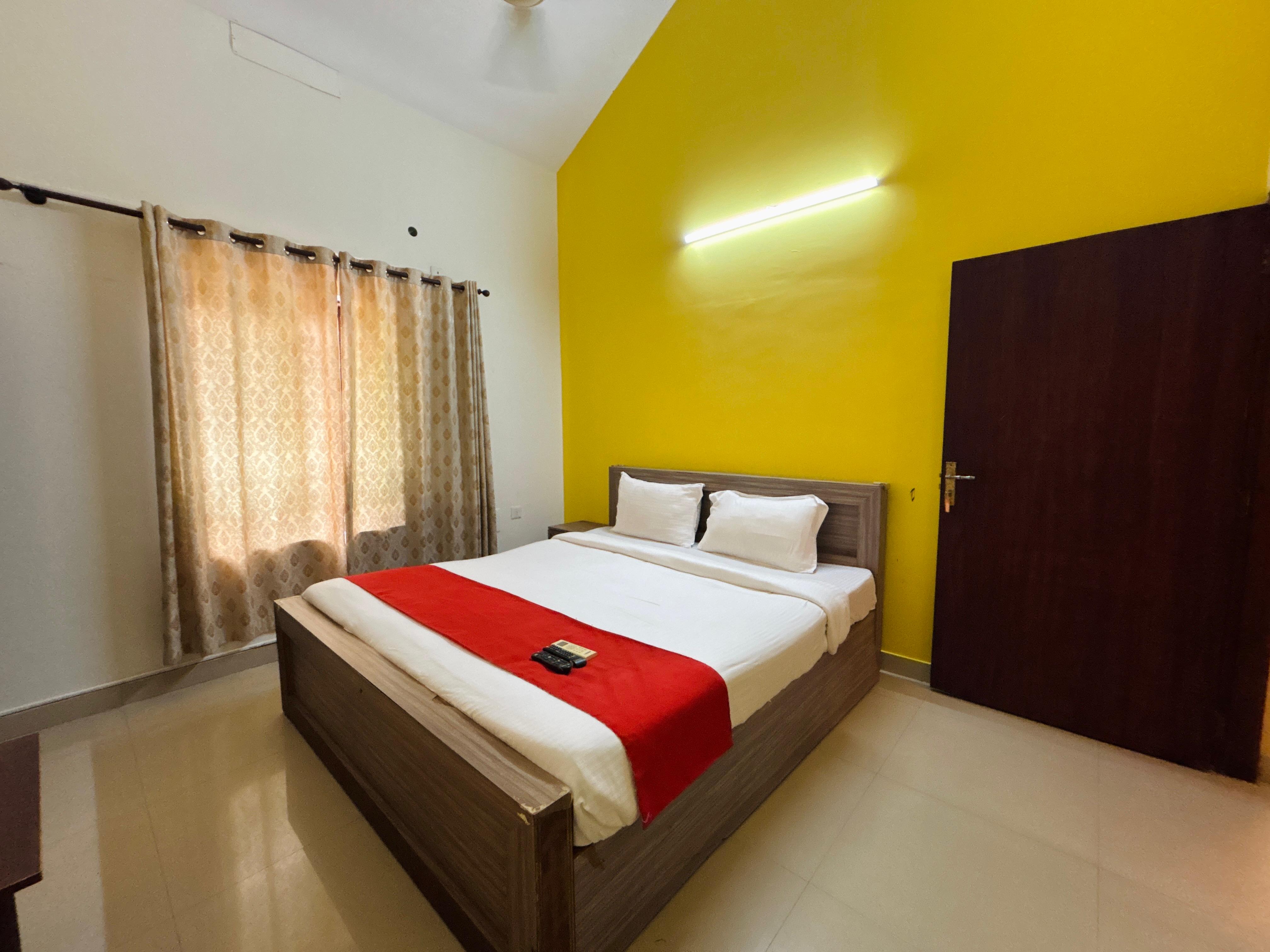 Malgudi Holidays Apartment | Rooms & Kitchen - Tap to explore photos