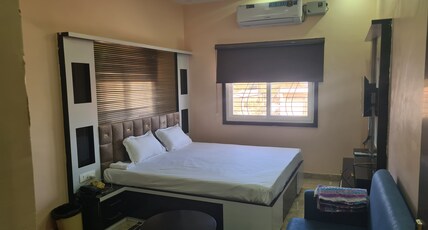 Manglani's lodging and restaurant Room Type - Deluxe Room