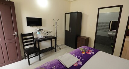 Classique Inn | Near Padmanabhaswamy Temple Room Type - 3BHK Apartment Non AC