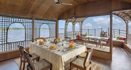 Kumarakom Lake Resort Room Type - One Bedroom Houseboat - Check in 12PM and Check-out 9.30AM Kumarakom Lake Resort Room Type - One Bedroom Houseboat - Check in 12PM and Check-out 9.30AM