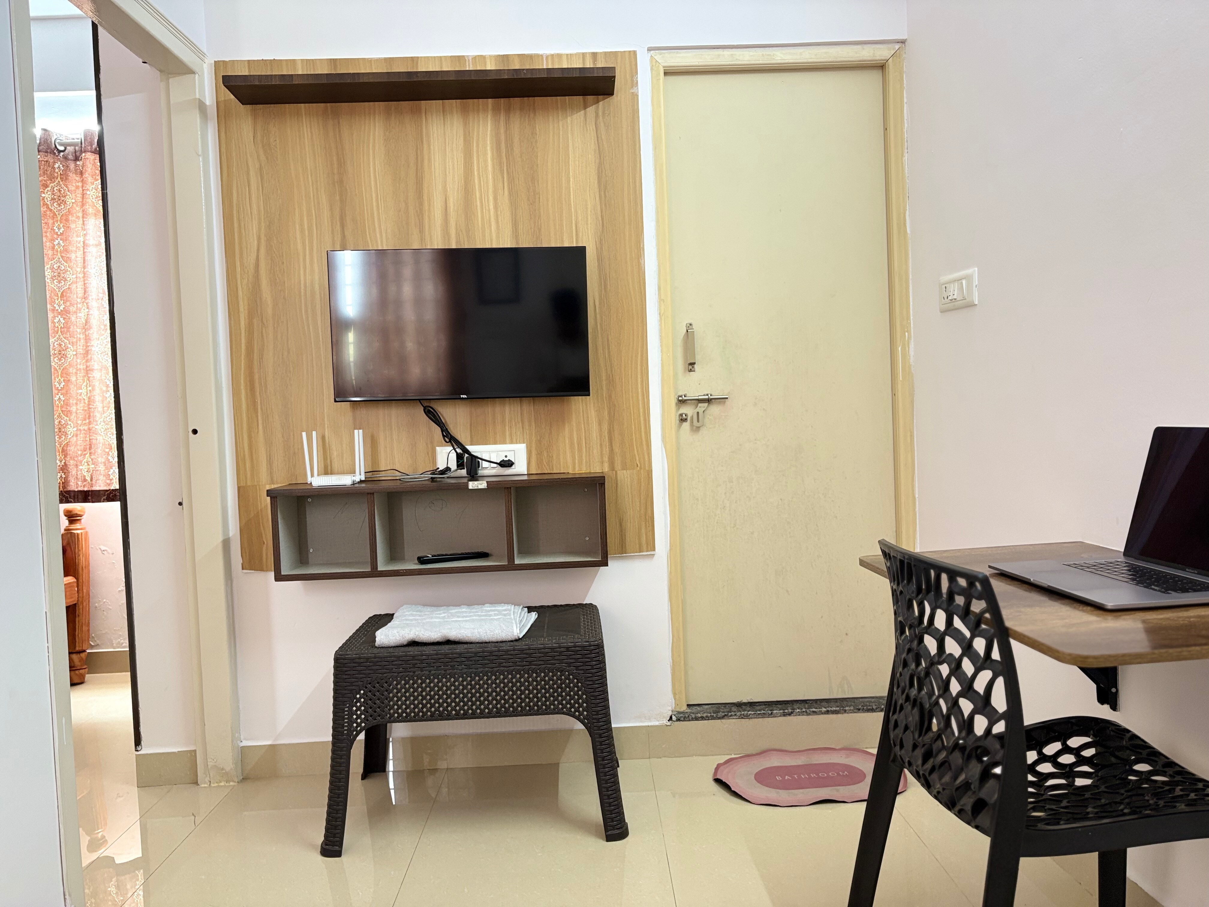 Compact Haralur Apartment by ANI Living Spaces - Tap to explore photos