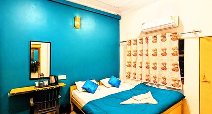 Hidden Monkey Hostel | Chet Singh Ghat Room Type - Private AC Room with Balcony (Temple View)