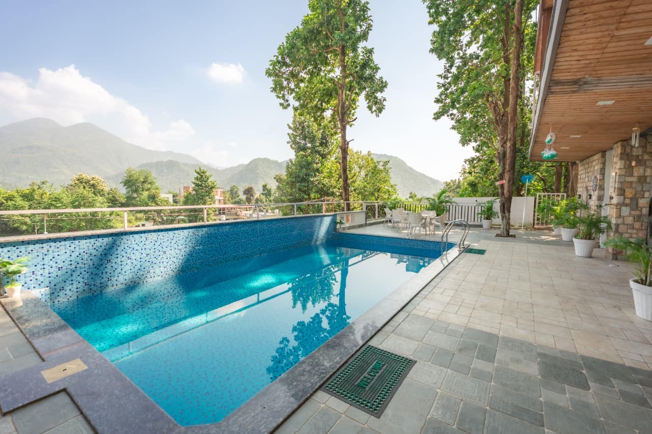 The Amara Woods Villa - Tap to explore photos