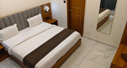 Hotel Krishnay Somnath bypass Room Type - STANDARD DOUBLE BED