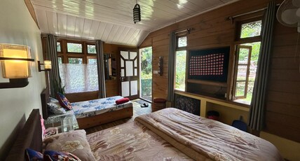 Travellers Homestay Room Type - 3 bedded standard