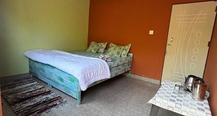 Maasa Retreat & Resort  Room Type - Deluxe Room with Mountain View King Bed