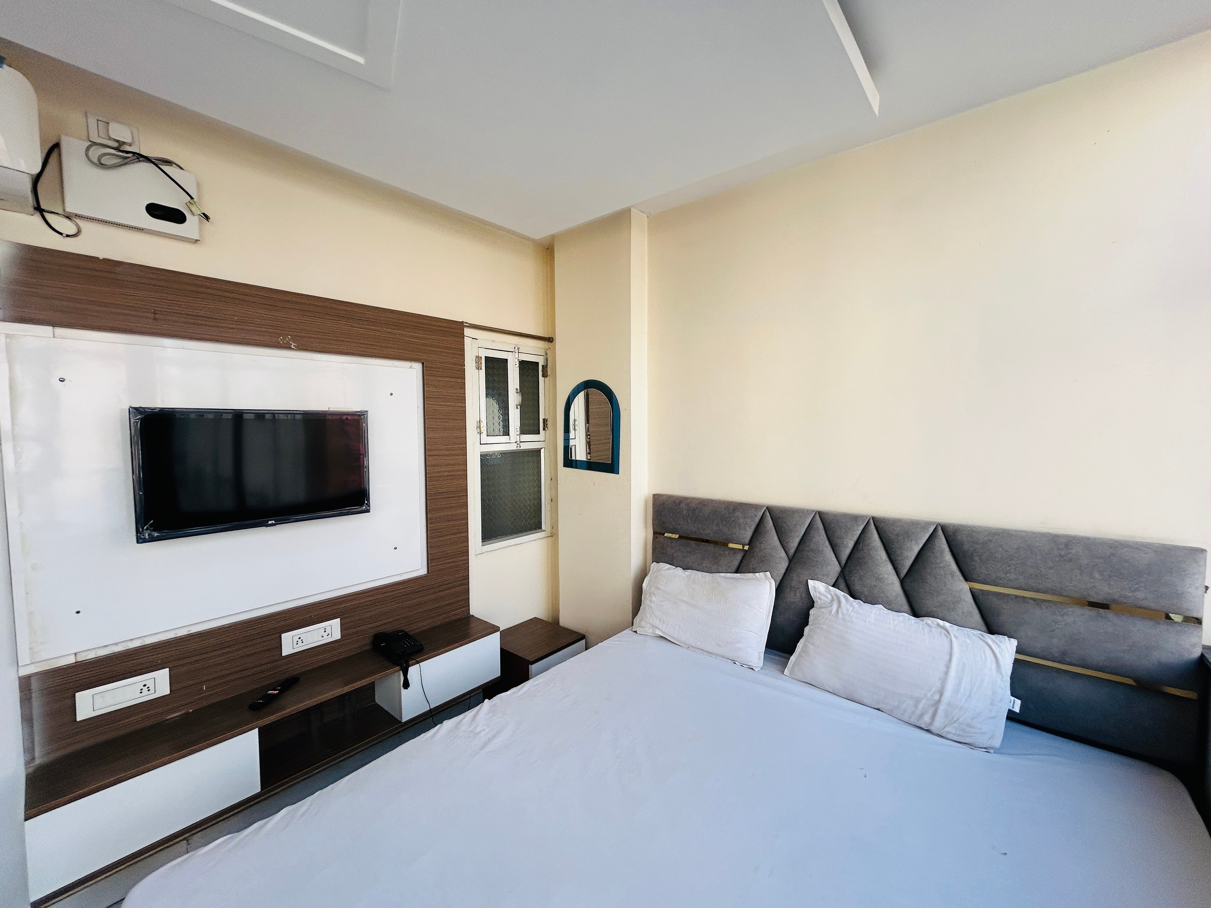 Hotel Ashika - Tap to explore photos