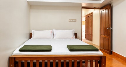 Sreevaishnavam | Traditional Stay Near Padmanabhaswamy Temple Room Type - Double Room AC 107