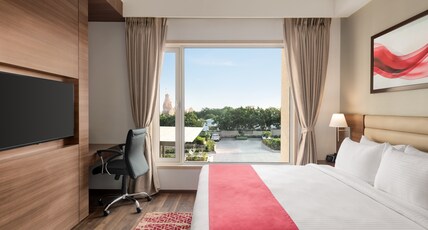 Ramada by Wyndham Gandhidham Shinay Room Type - 1 King Bed, Deluxe Room, Non-Smoking