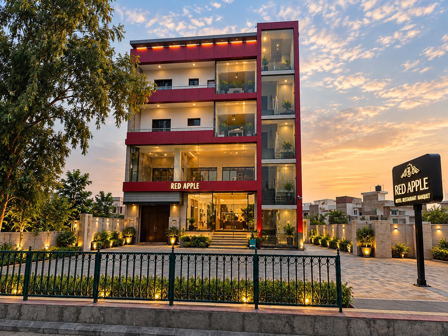 Red Apple Hotel - Tap to explore photos