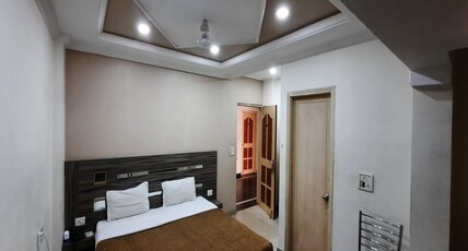 Hotel Sun-Om @ Raipur Railway Station Room Type - Deluxe AC Rooms
