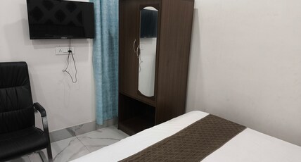 Hotel Vidyashankar Inn Room Type - Triple Room Deluxe AC with Sofa Cum Bed