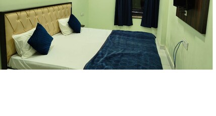Hotel Ruma Palace Room Type - City View King Bed Room