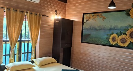 Mudravilla Room Type - A/C Deluxe cottage (yellow)