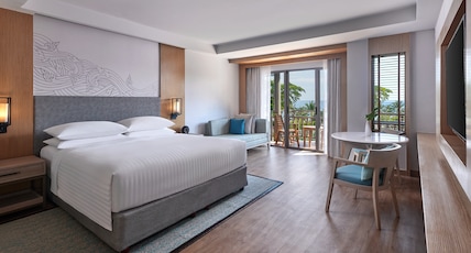 Phuket Marriott Resort & Spa, Merlin Beach Room Type - Larger Guest room, 1 King, Pool view Phuket Marriott Resort & Spa, Merlin Beach Room Type - Larger Guest room, 1 King, Pool view