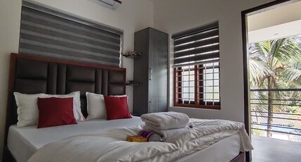 Dune Homestay | 100 mtr to Alleppey Beach Room Type - AC Room with Balcony - Room 3