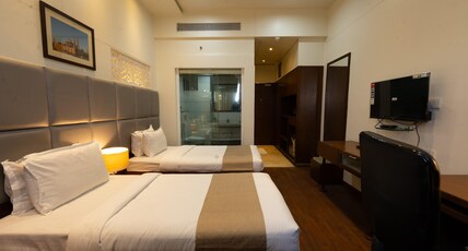 Manish Aura Grand Room Type - DeluxTwin