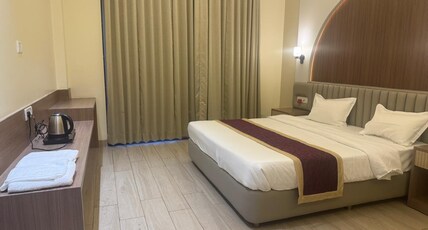 Agastya Resort Lucknow Room Type - Luxury Room with Garden View