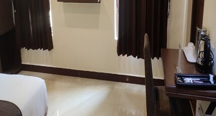 Olives pleasant stay Room Type - Deluxe Room with Balcony