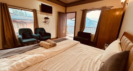 Nature Trend Resort Guptkashi Room Type - Mountain View Premium Room ( With Balcony ) Nature Trend Resort Guptkashi Room Type - Mountain View Premium Room ( With Balcony )