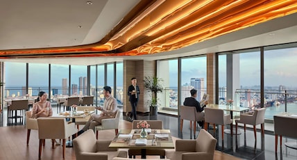 NOVOTEL DANANG PREMIER HAN RIVER Room Type - Executive Corner, balcony, panoramic view of Dragon Bridgeand Premier Lounge Access- 1 king bed NOVOTEL DANANG PREMIER HAN RIVER Room Type - Executive Corner, balcony, panoramic view of Dragon Bridgeand Premier Lounge Access- 1 king bed