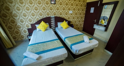 Asian Suites Guwahati Room Type - Standard AC Room Asian Suites Guwahati Room Type - Standard AC Room