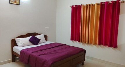 BRUNDAVAN HOMESTAY Room Type - Deluxe Queen Room