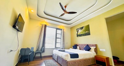 Devlok Homes Room Type - Delux room