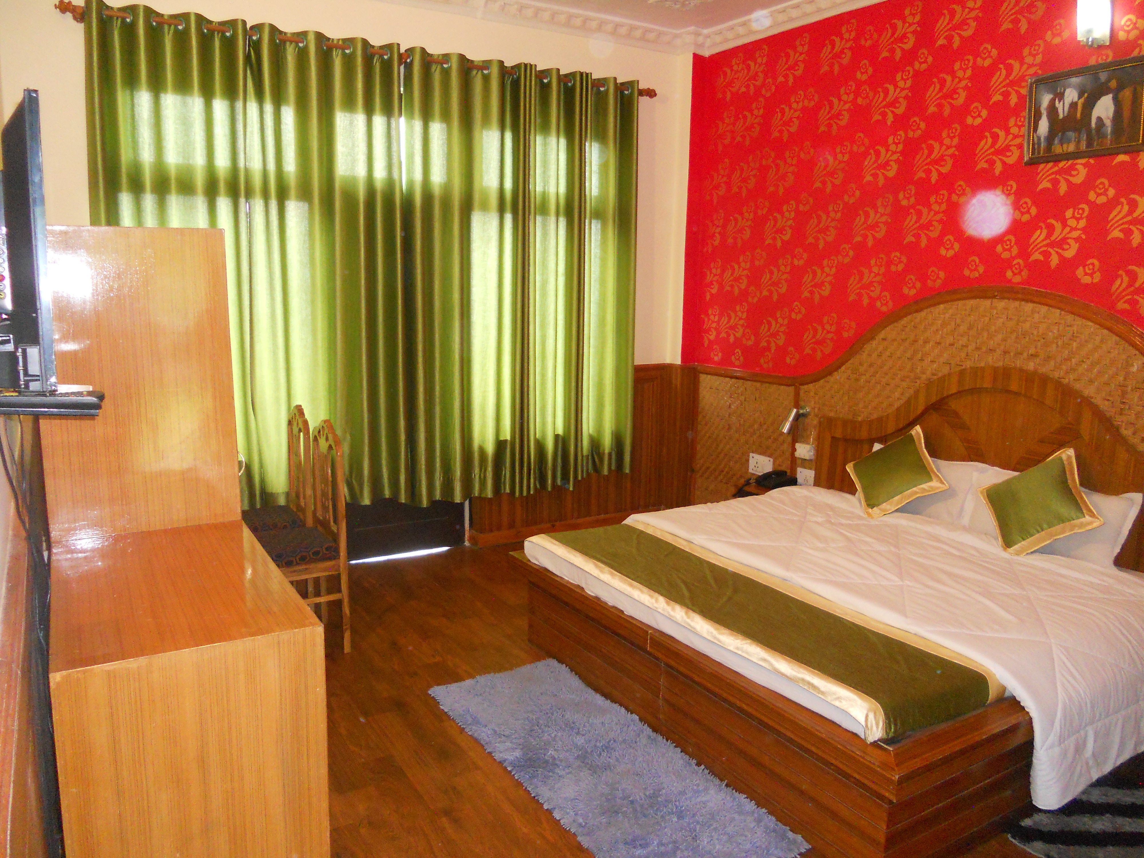 Hotel Sumit Kausani - Tap to explore photos