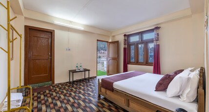 Kinnor Retreat Room Type - Semi Deluxe with private balcony(Mountain & River View)
