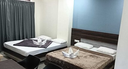 Dharwad Residency Room Type - Deluxe Four Bed Room AC Dharwad Residency Room Type - Deluxe Four Bed Room AC