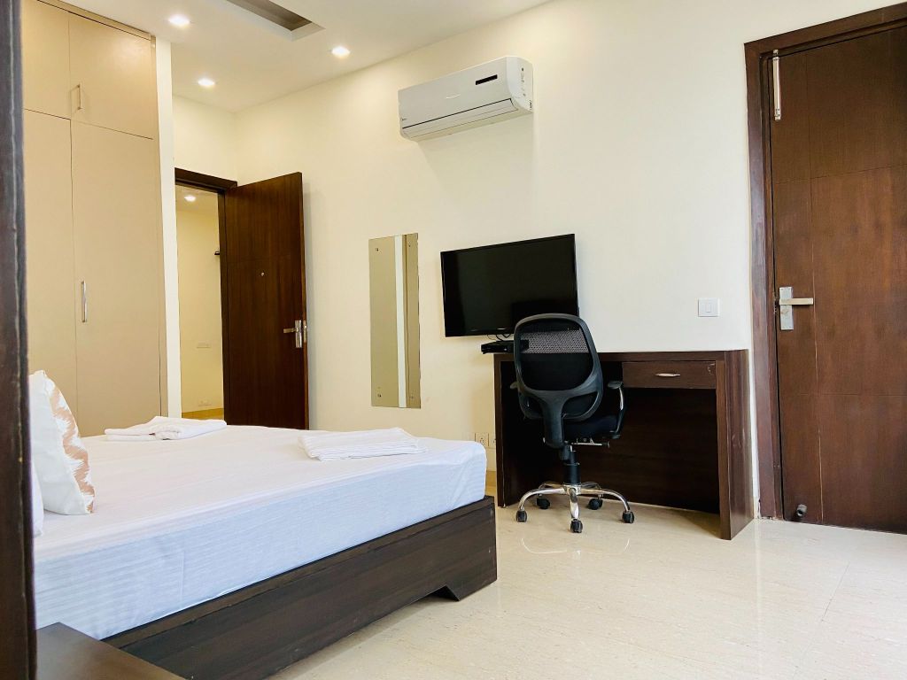 Entire 4BHK Apartment by Bluo at Cyber City - Tap to explore photos